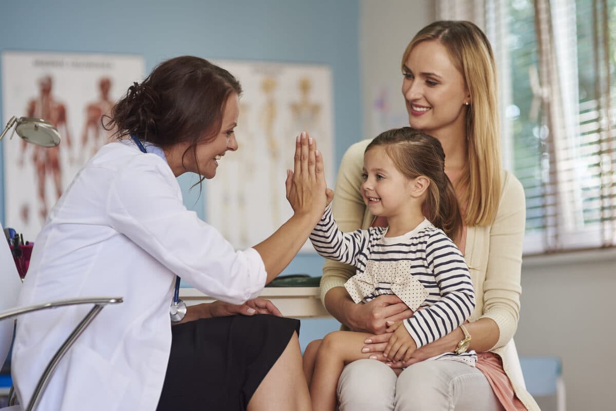 Child receiving childhood vaccinations - Princeton area pediatrician