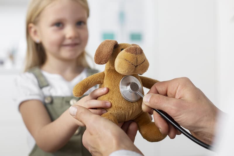 Pediatrician conducting well-child examination in Robbinsville Hamilton Princeton area